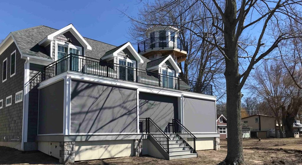 Prestige Shade - Elite Outdoor Environments Sun shade protecting patio from outdoor elements