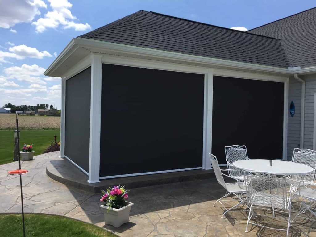 Prestige Shade - Elite Outdoor Environments Outdoor patio with sun shade down on all sides providing complete protection and superior privacy